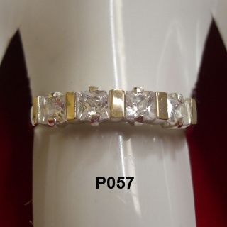 Anel aparador de prata com zirconias e apliques de ouro-P057